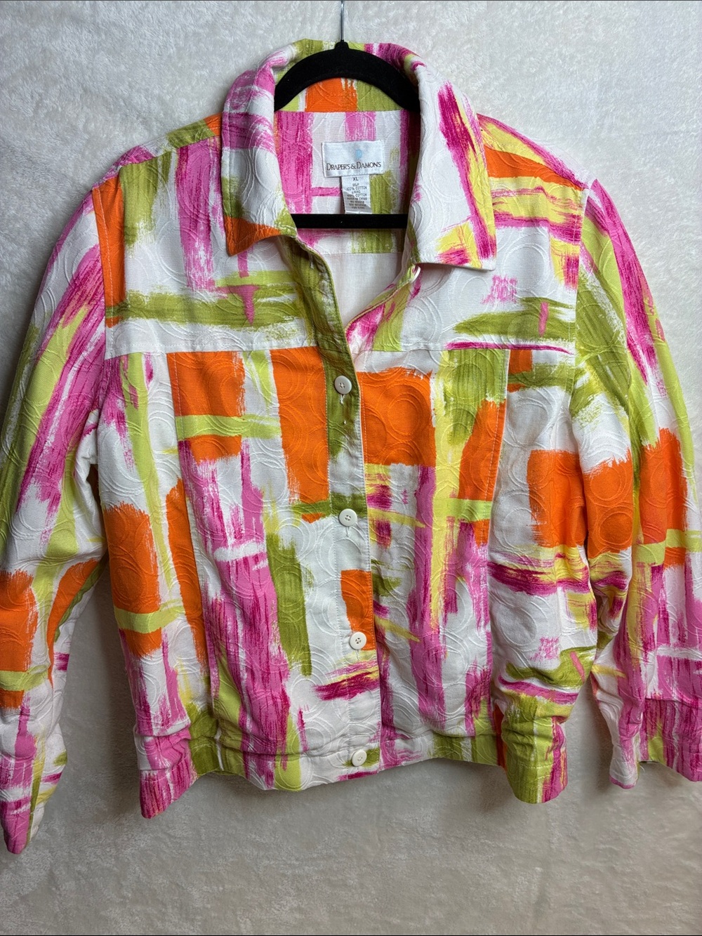 Drapers and Damon’s White Jean Jacket with Pink, Orange & Green Brushstroke Prin